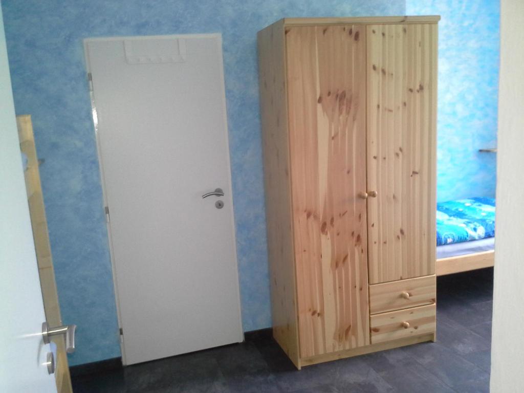 Postel nebo postele na pokoji v ubytování Apartmán Hastrmánek, Kvilda 3