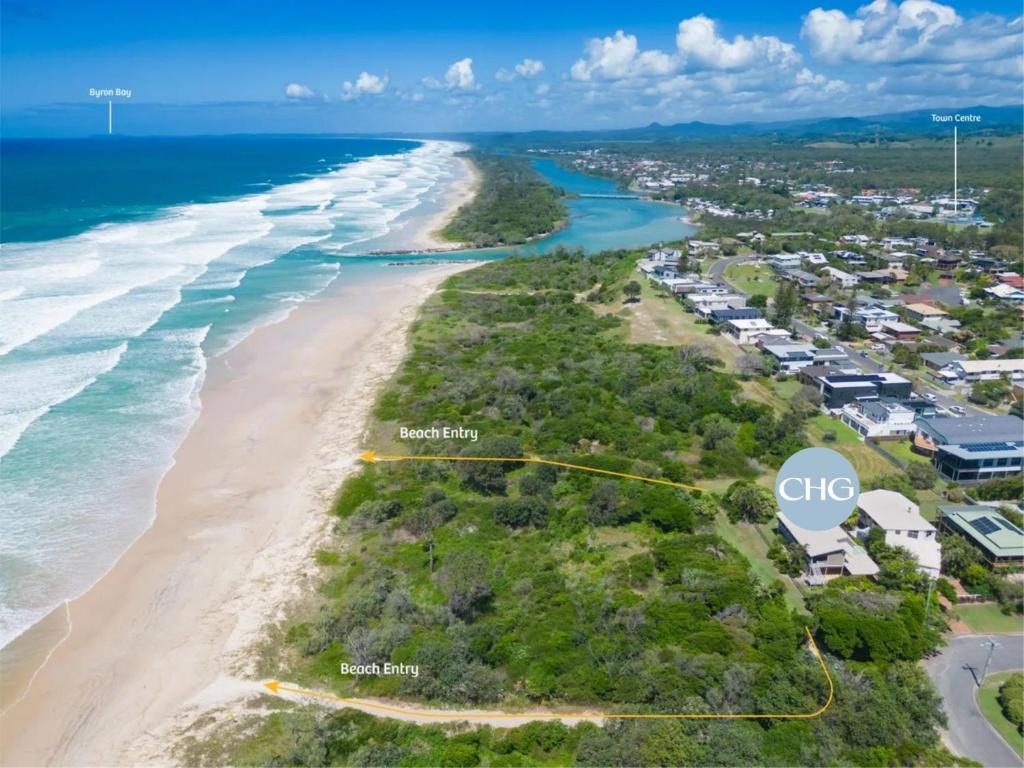 an aerial view of the shoreline of a beach at Classic Beach House on Surfside - Pet Friendly in Pottsville