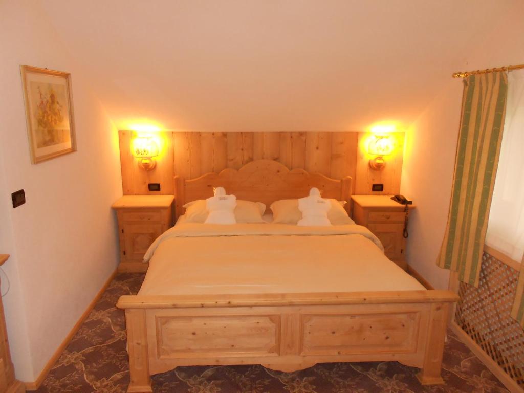 Postel nebo postele na pokoji v ubytování Hotel Relais Grünwald