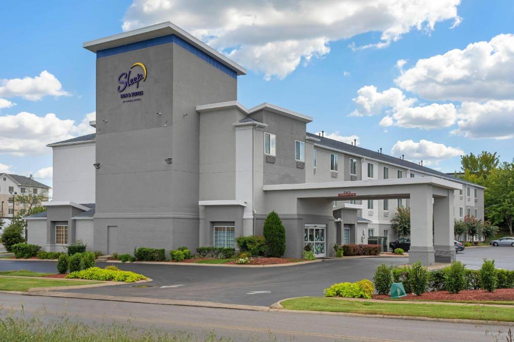 a building with a sap sign on the side of it at Sleep Inn &amp; Suites Smyrna - Nashville Area in Smyrna