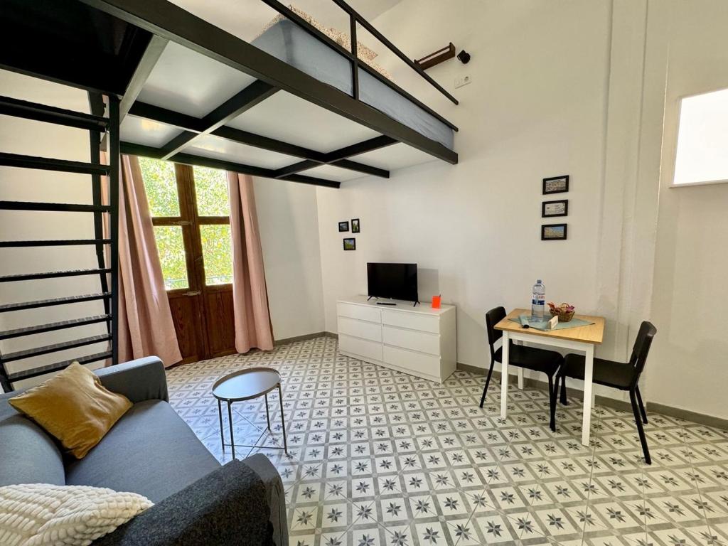 TV a/nebo společenská místnost v ubytování Studio La Palma