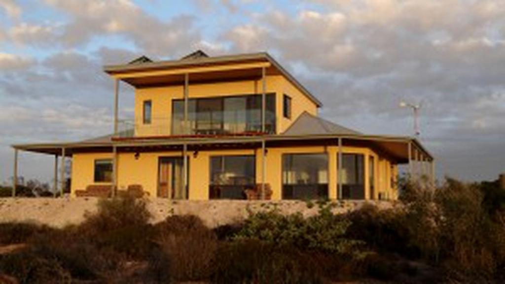Image showcasing Eco-Friendly Cabin with a Deck and Ocean Views near Venus Bay in South ...