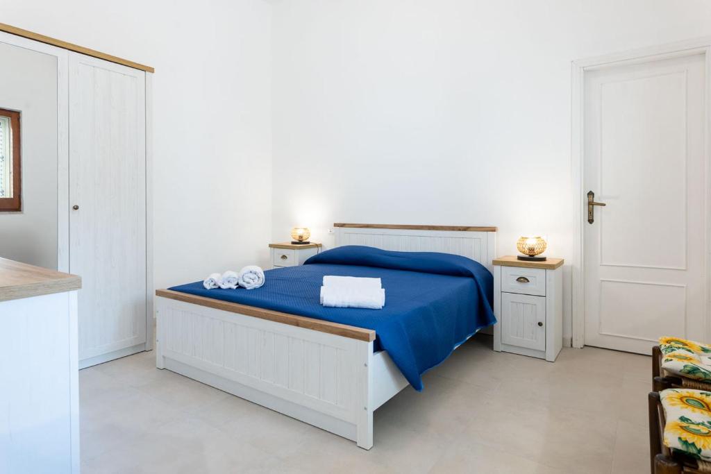 Voodi või voodid majutusasutuse Brezza Marina toas