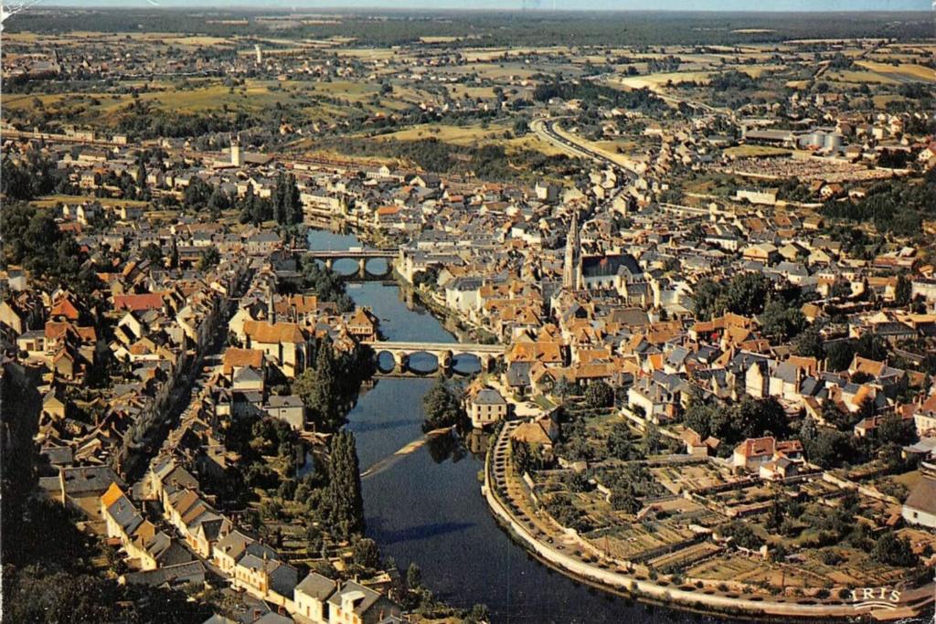 an aerial view of a city with a river at Maison du Jardinier in Argenton-sur-Creuse