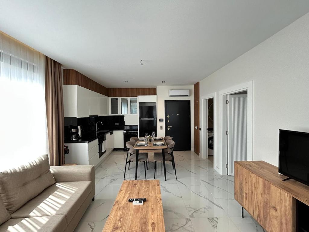 Μια τηλεόραση ή/και κέντρο ψυχαγωγίας στο Luxury Holiday Apt in the Town