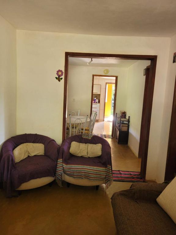 Postel nebo postele na pokoji v ubytování Bangalô in Santana dos Montes