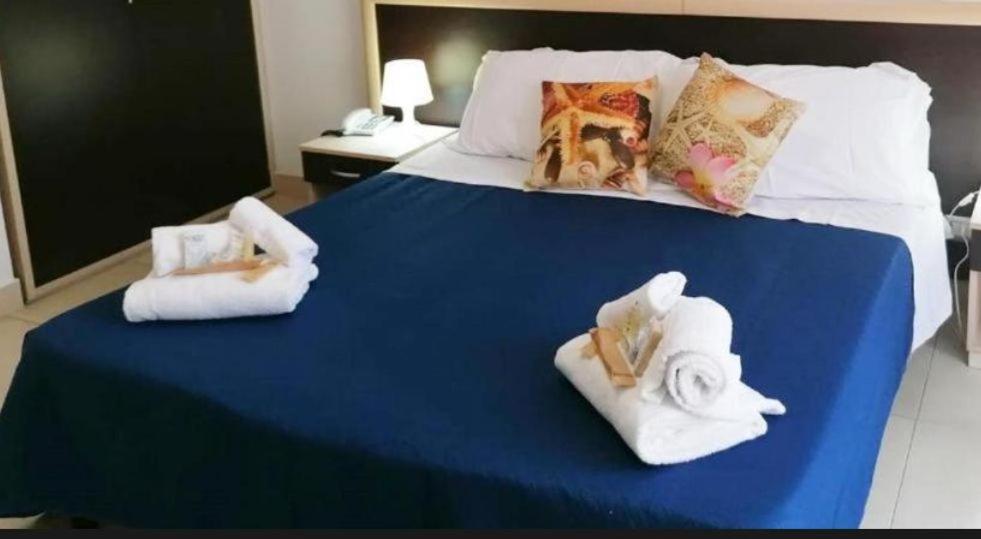 Katil atau katil-katil dalam bilik di Sirina House Taormina