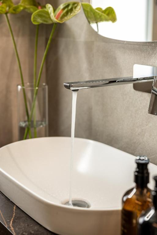 Aramis Deluxe Rooms - 10