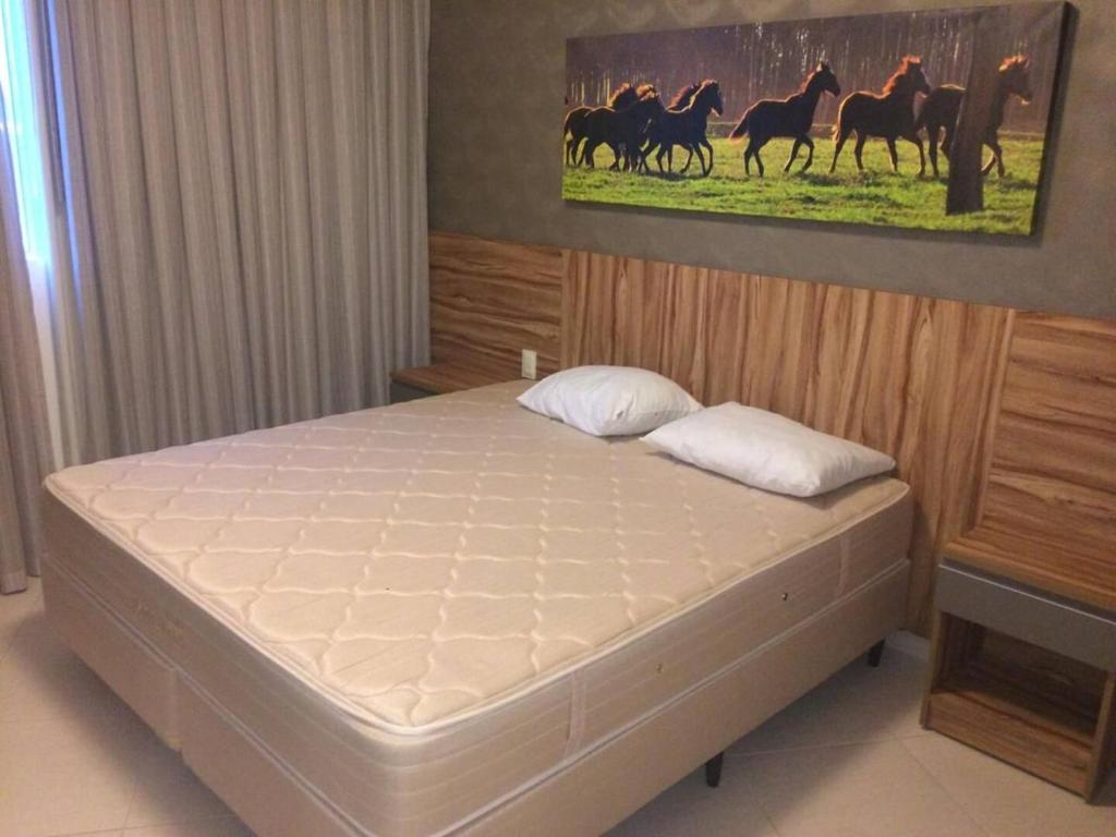 Postel nebo postele na pokoji v ubytování Apartamento CondoHotel Barretos Park do Peão 1232