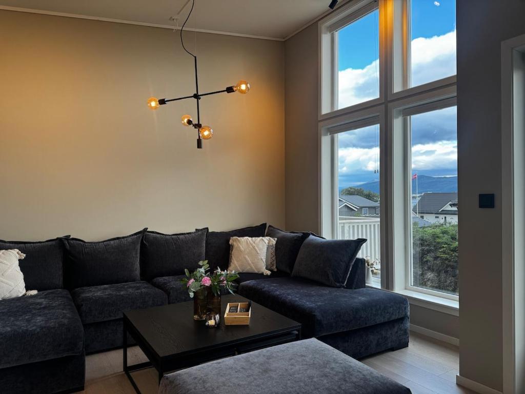 Χώρος καθιστικού στο Modern apartment, large terrace free parking and Wallbox