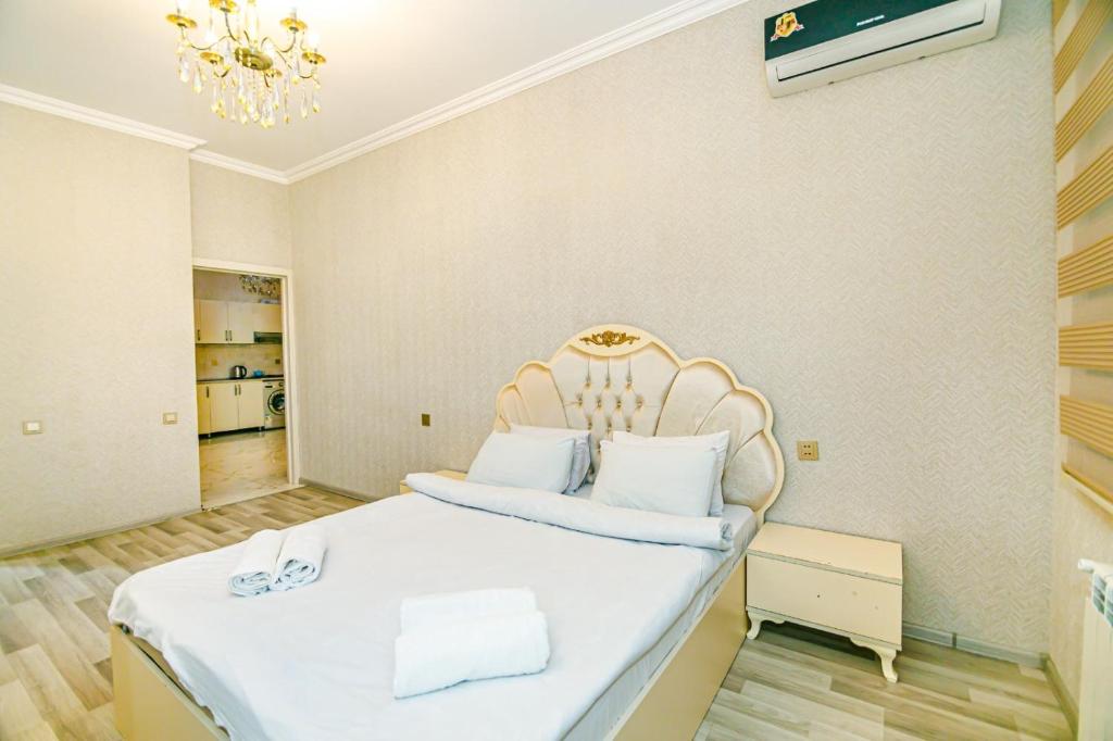 Llit o llits en una habitació de PARK Apartment