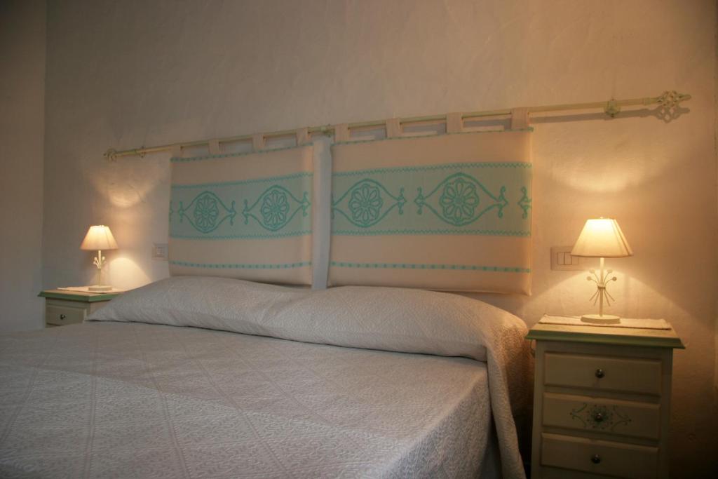 Voodi või voodid majutusasutuse Agriturismo Fioredda toas