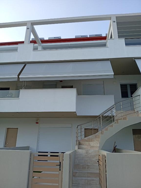 a stairway leading up to a building at GN summer guest house P in Leptokarya