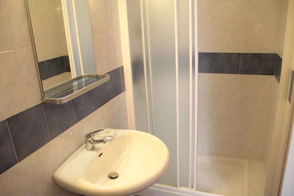 Koupelna v ubytování Hotel Siro