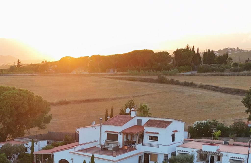 an aerial view of a house and a field at Villa de Gracia Casa 2 in Tordera