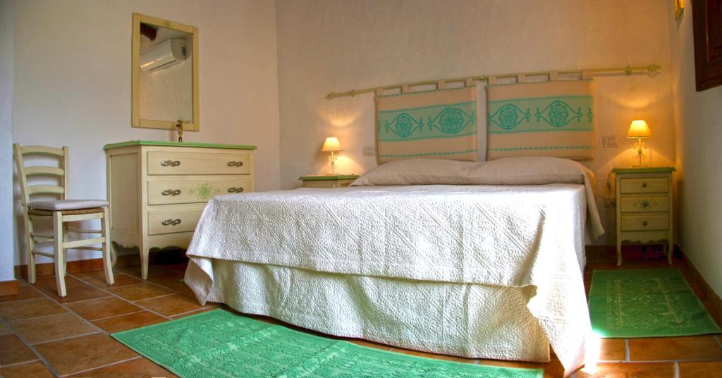 Voodi või voodid majutusasutuse Agriturismo Fioredda toas
