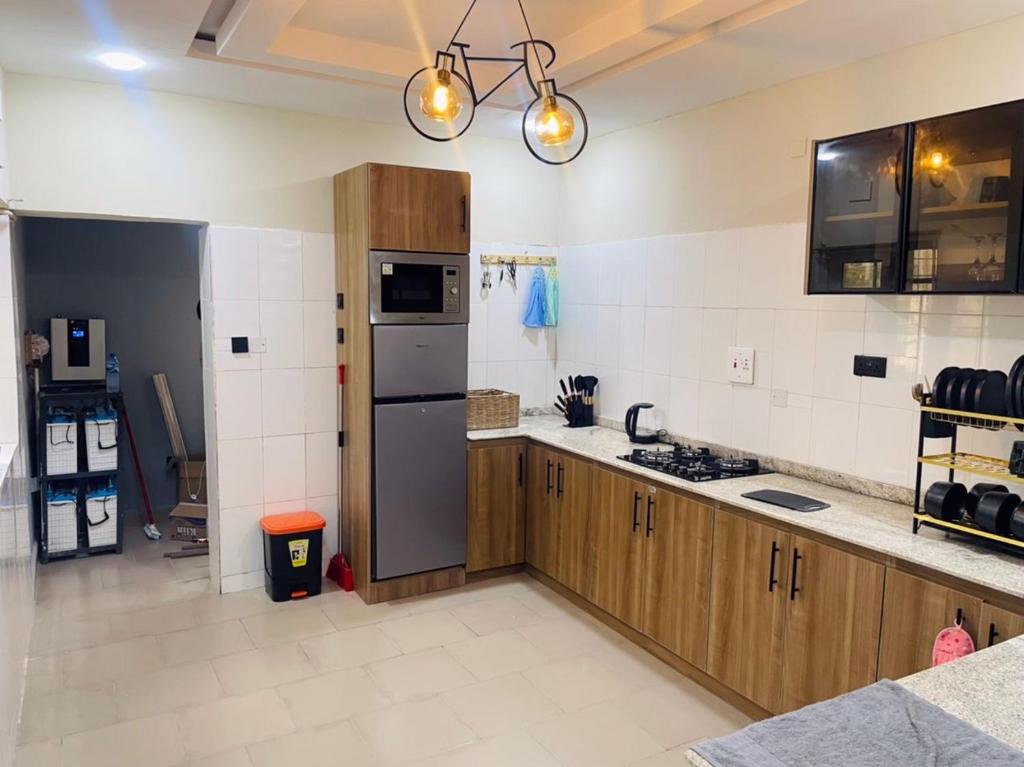 Kuchyň nebo kuchyňský kout v ubytování Dbellaz Home