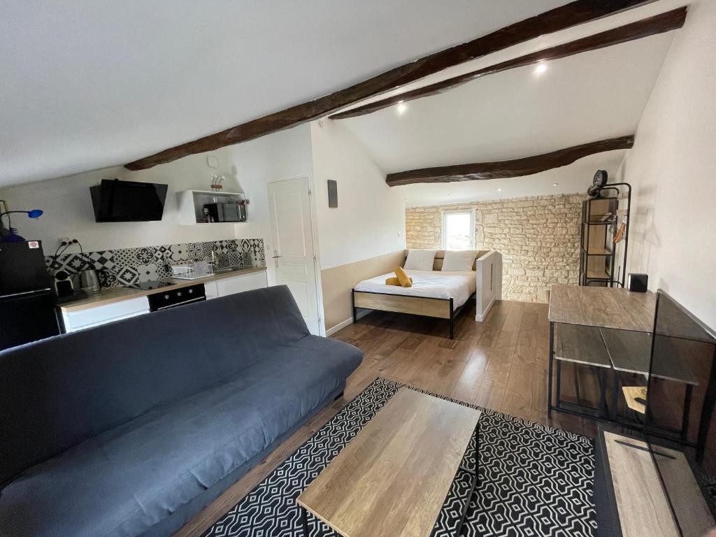 Postel nebo postele na pokoji v ubytování Chez Jean-Yves et Zoé - LE SAINT ANDRÉ - Au calme, Très propre, Proche parkings, Clim