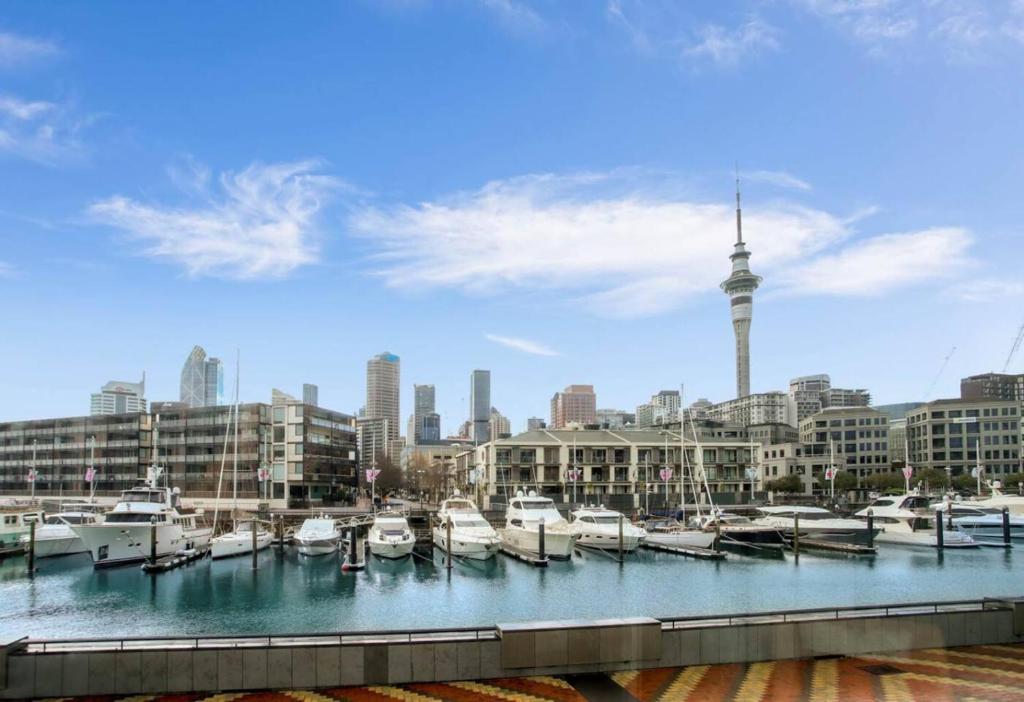 a group of boats docked at a marina with auckland at QV Stays Modern City Retreat in Auckland