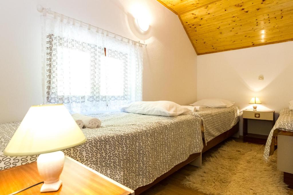 Posteľ alebo postele v izbe v ubytovaní Forest Escape