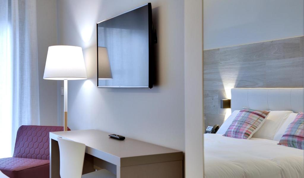 Postel nebo postele na pokoji v ubytování Hotel Lemik