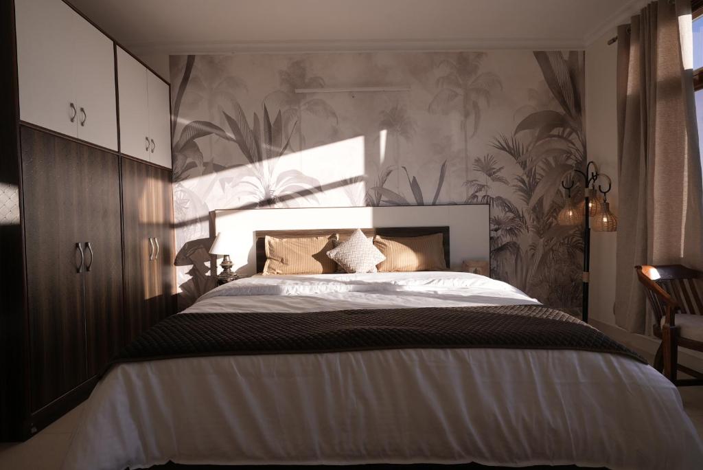 Postel nebo postele na pokoji v ubytování Wandernest Homes Boho Bliss