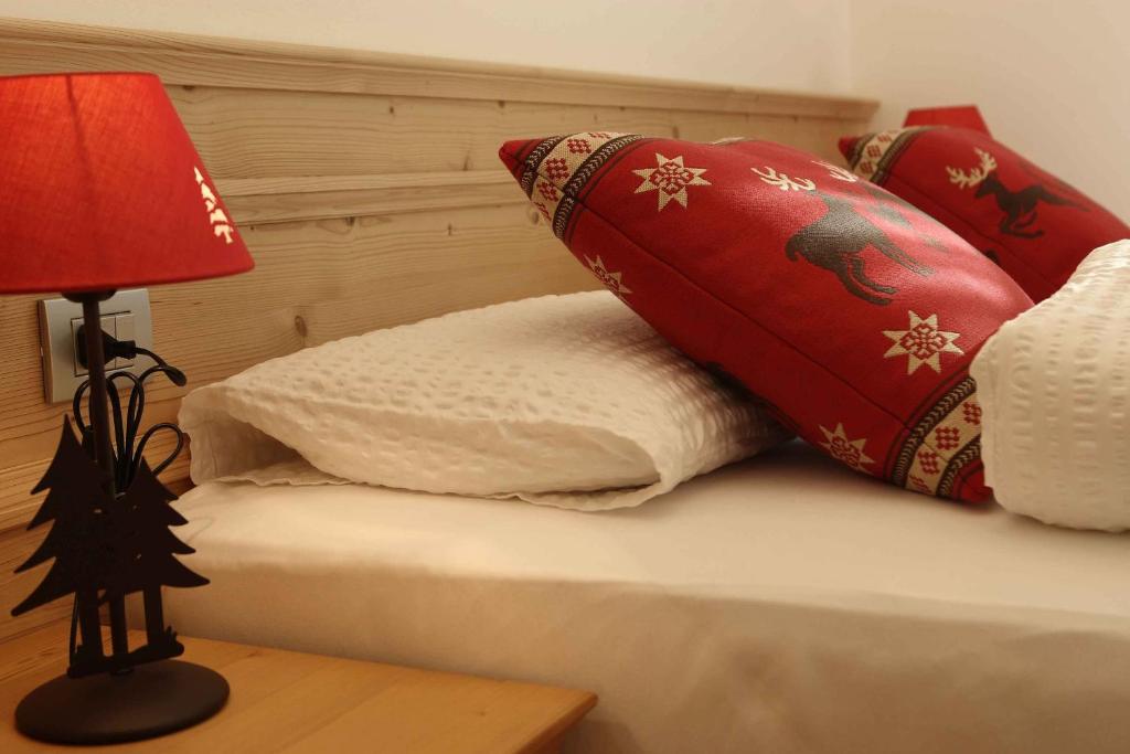 Postel nebo postele na pokoji v ubytování Apartments Sol E Nef