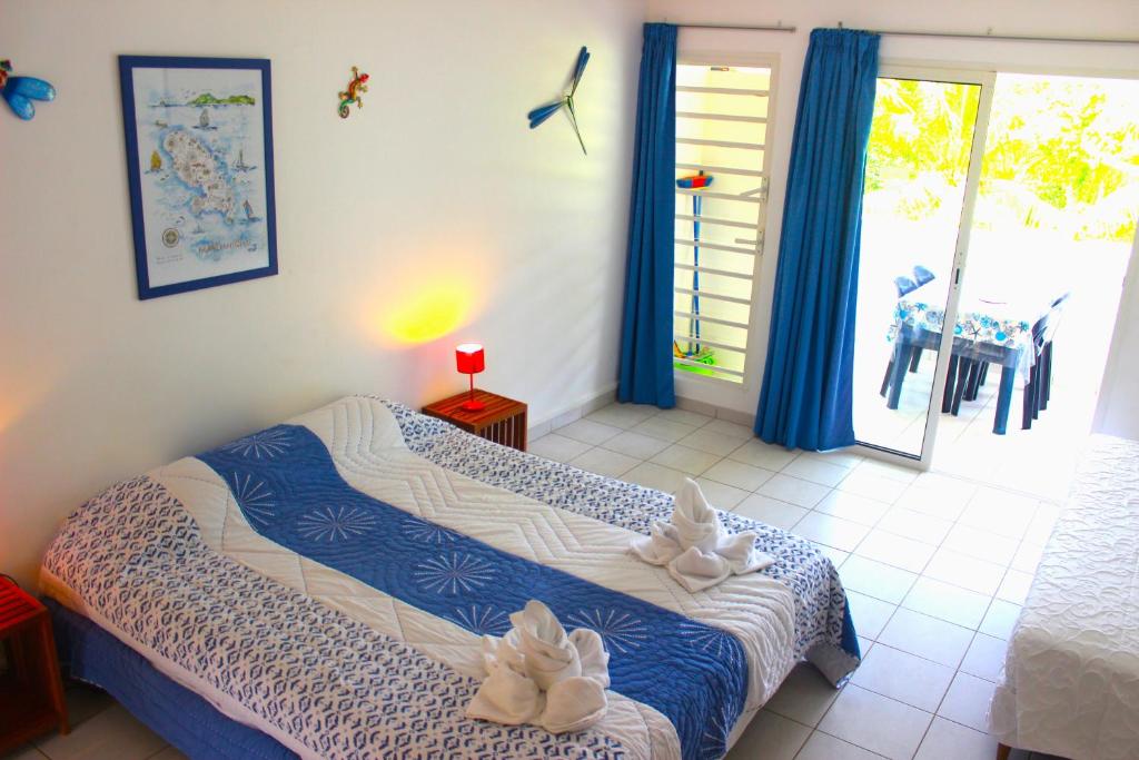 Postel nebo postele na pokoji v ubytování Residence Les Cayalines