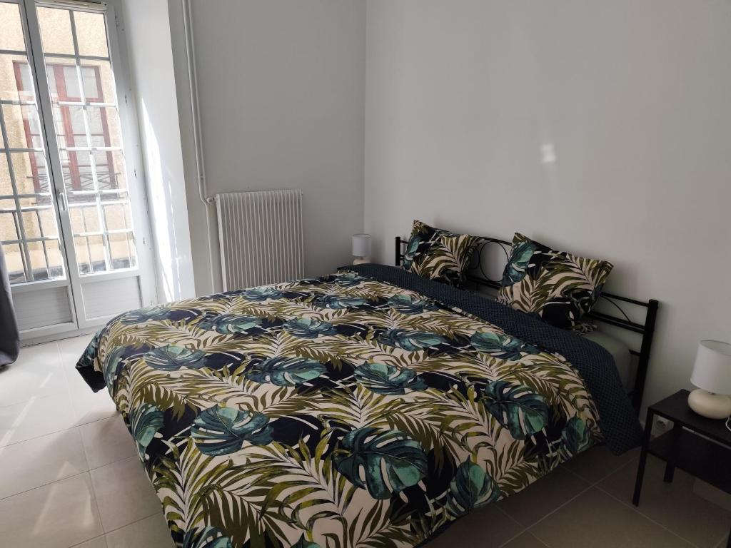 Ένα ή περισσότερα κρεβάτια σε δωμάτιο στο O'Couvent - Appartement 212 - 1 chambre - 63 m2 - Premier étage