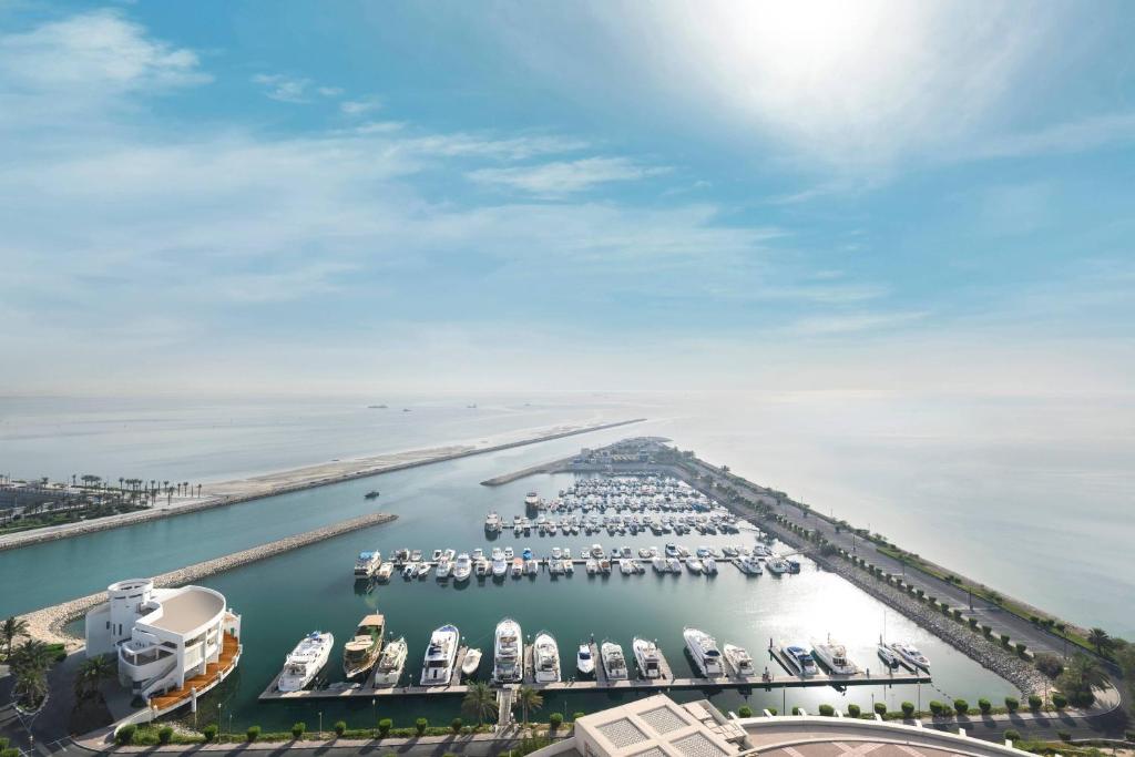 an aerial view of a marina with boats docked at The Ritz-Carlton, Doha in Doha