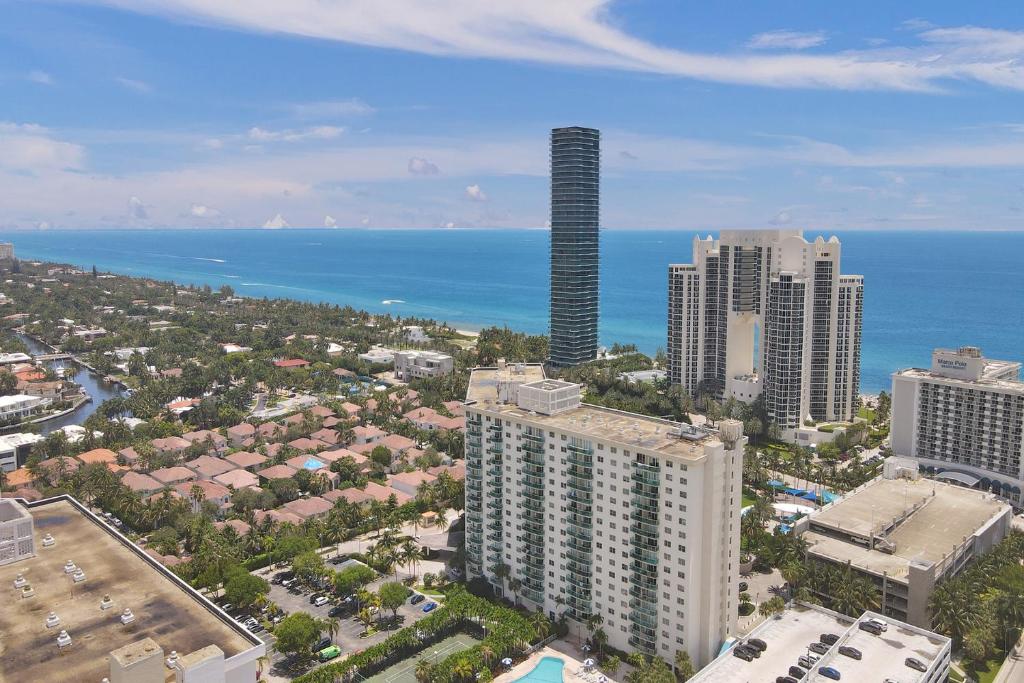 an aerial view of a city with the ocean at Ocean Reserve Condominium in Miami Beach