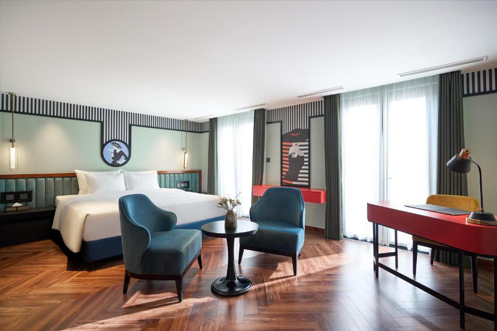 Una cama o camas en una habitación de Solaria Tesori Hotel