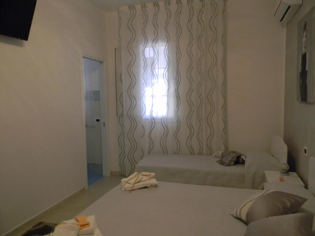 Postel nebo postele na pokoji v ubytování B&B Giorgio La Pira