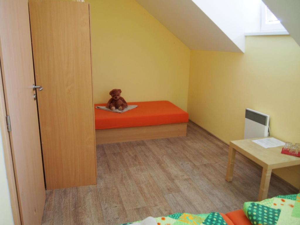 Postel nebo postele na pokoji v ubytování Penzion u Ivana