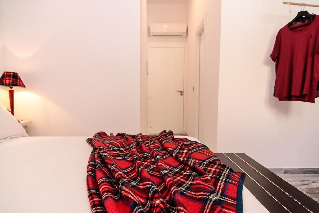 Posteľ alebo postele v izbe v ubytovaní The 8 Rooms House