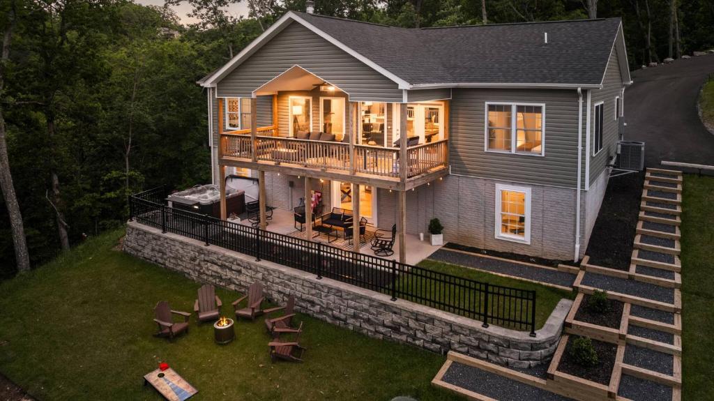 an aerial view of a house with a deck and patio at The Apple Mountain House in Front Royal