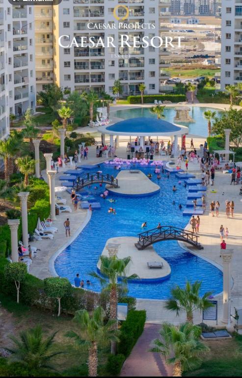 an aerial view of a large pool in a resort at 2 Bedrooms At Caesar Resort & Spa Iskele Claudius 9 in Iskele