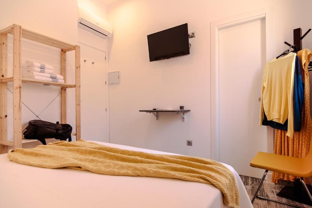 Posteľ alebo postele v izbe v ubytovaní The 8 Rooms House