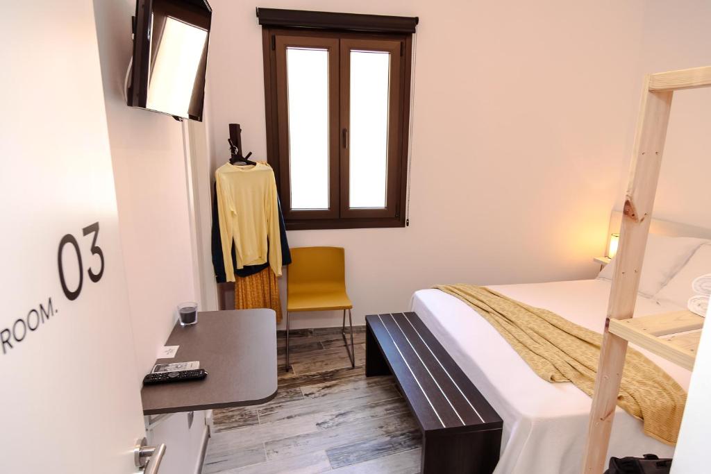 Posteľ alebo postele v izbe v ubytovaní The 8 Rooms House