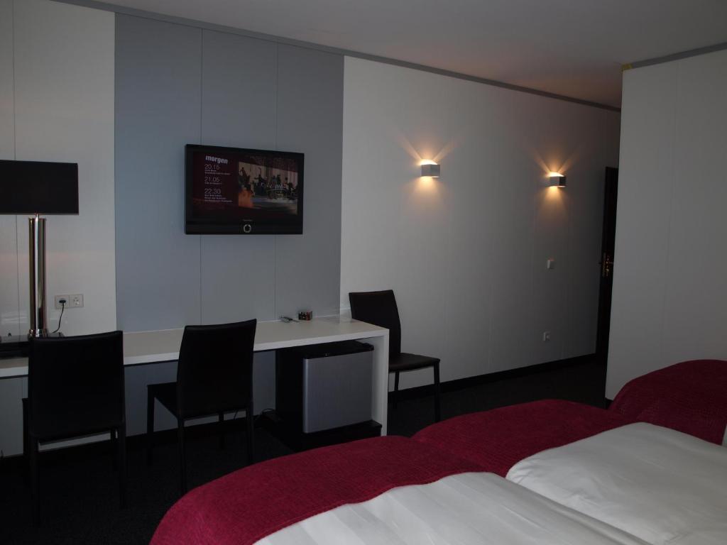 Postel nebo postele na pokoji v ubytování B&B Pommerloch