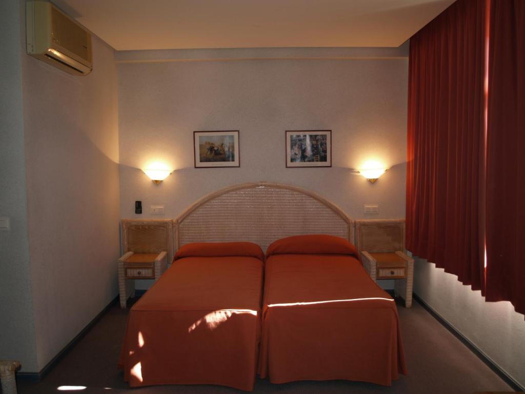 Cama o camas de una habitación en Hotel San Jorge