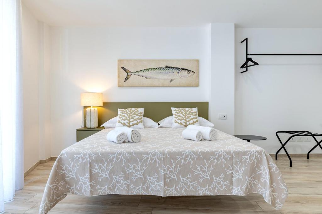 Una cama o camas en una habitación de Le camere Delù