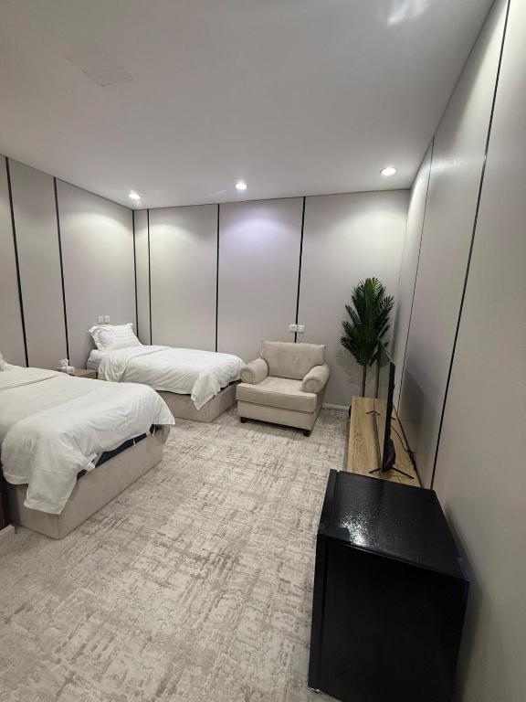 Postel nebo postele na pokoji v ubytování غرفة ستوديو فندقية