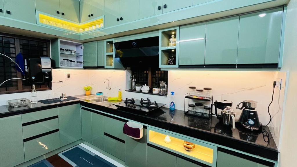 Kuchyň nebo kuchyňský kout v ubytování Green Villa