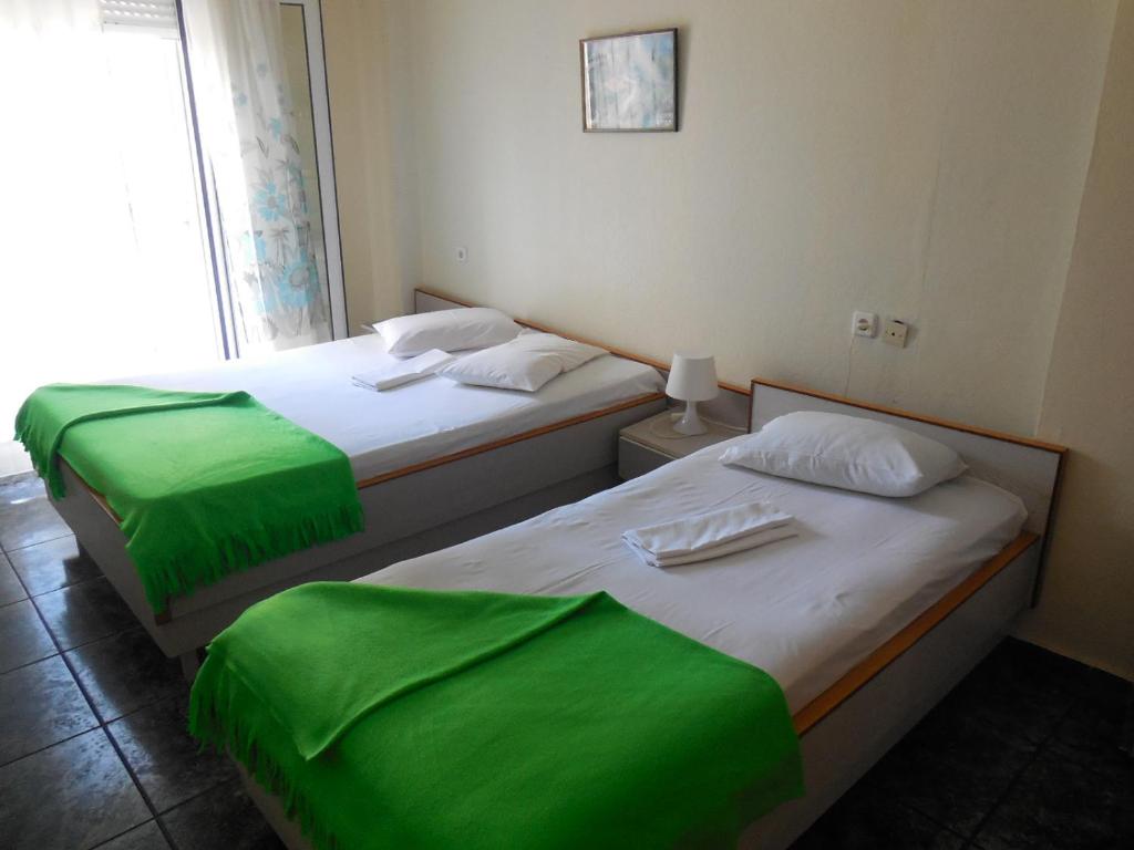 Postel nebo postele na pokoji v ubytování Hotel Dias Apartment