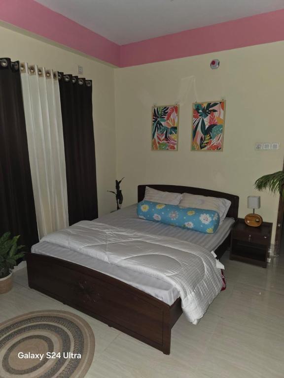 Giường trong phòng chung tại Enjoy Your Time