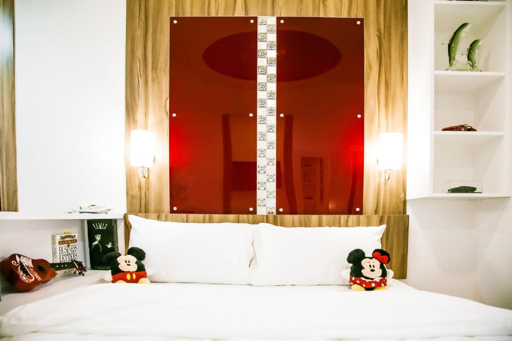 Postel nebo postele na pokoji v ubytování Sunset Residence Pinklao