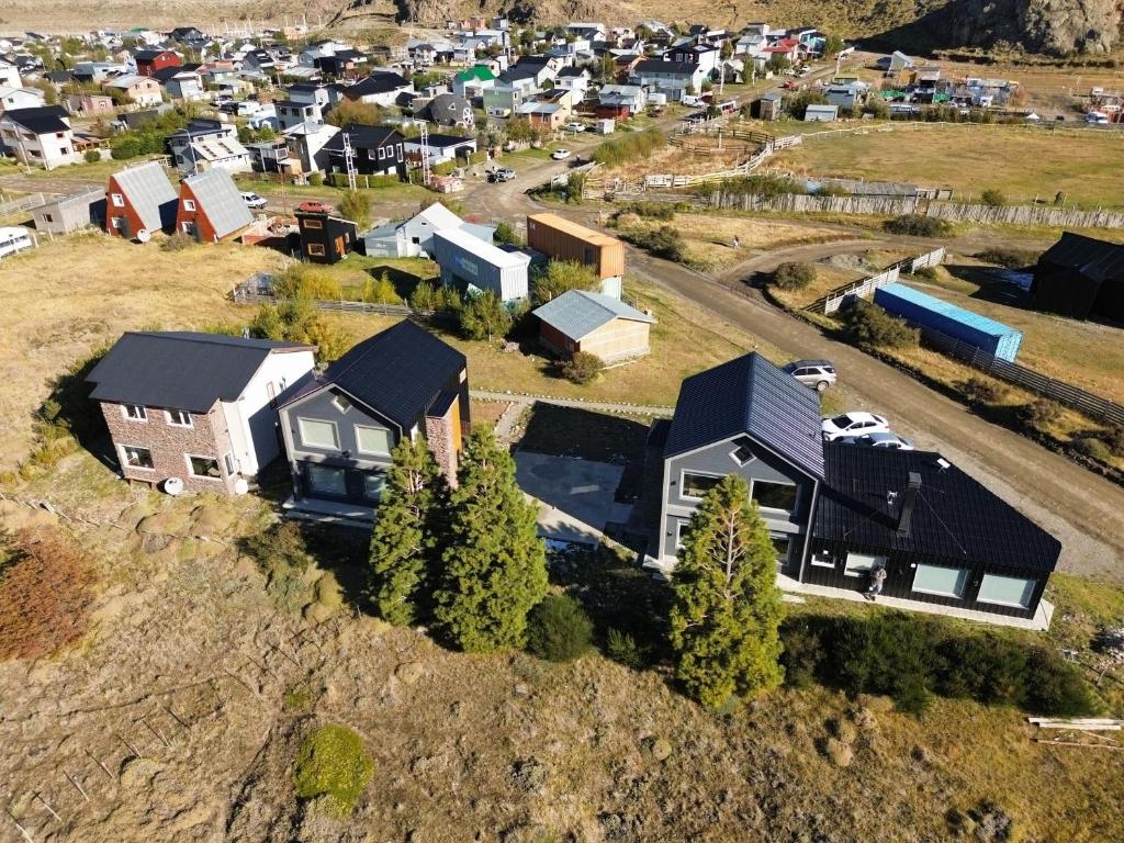 an aerial view of a small town with houses at Buenavista Chalten, Casa de Montaña in El Chalten