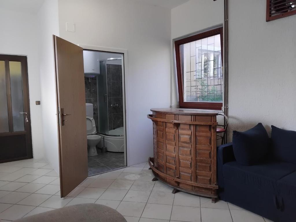 Ένα μπάνιο στο Apartman Buco