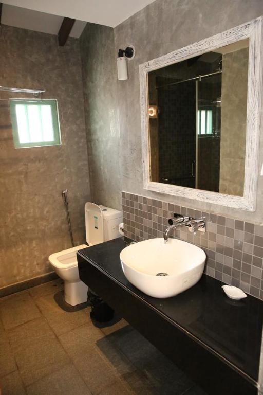 Koupelna v ubytování Lar Amorosa Boutique Hotel - Goa